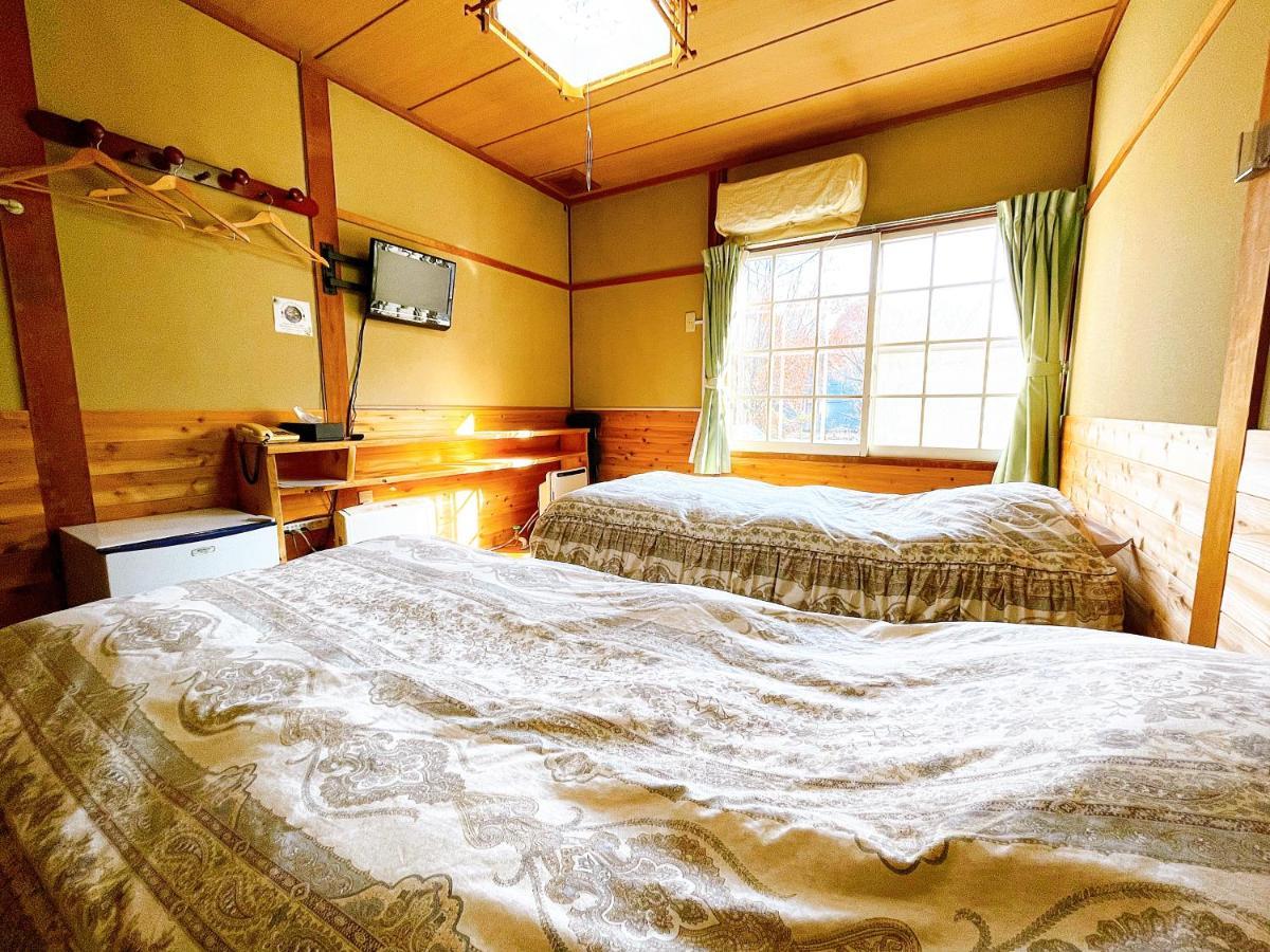 Hakuba Pension & Log Hotel Meteor Экстерьер фото